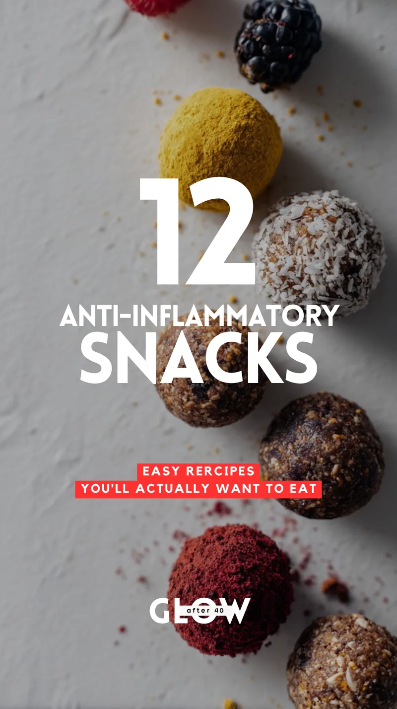 A close-up view of colorful, round energy bites scattered on a white textured surface, featuring turmeric-coated, coconut-rolled, and vibrant red berry-dusted variations. A large text overlay reads 12 anti-inflammatory snacks and notes they are easy recipes you will actually want to eat.